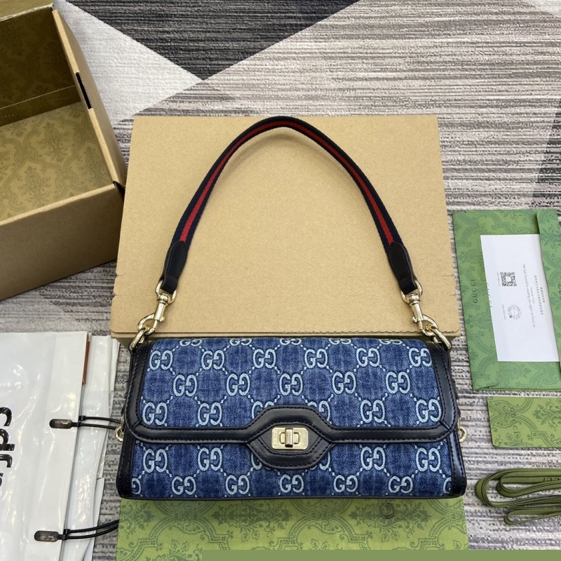 G*u*i top handle bags